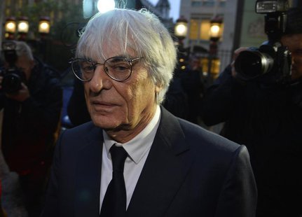 Formula One Chief Executive Bernie Ecclestone leaves the High Court in central London November 6, 2013. REUTERS/Toby Melville Formula One Chief Executive Bernie Ecclestone leaves the High Court in central London November 6, 2013. REUTERS/Toby Melville