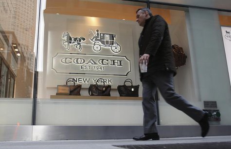 A man walks past a Coach store on Madison Avenue in New York, January 23, 2013. REUTERS/Carlo Allegri A man walks past a Coach store on Madison Avenue in New York, January 23, 2013. REUTERS/Carlo Allegri