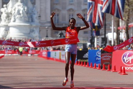 Priscah Jeptoo of Kenya wins the women's Elite London Marathon in central London, April 21, 2013. REUTERS/Andrew Winning Priscah Jeptoo of Kenya wins the women's Elite London Marathon in central London, April 21, 2013. REUTERS/Andrew Winning