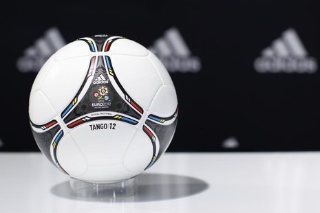A "Tango 12" soccer ball for the upcoming Euro 2012 soccer tournament is displayed during a news conference at the sporting goods maker Adid A "Tango 12" soccer ball for the upcoming Euro 2012 soccer tournament is displayed during a news conference at the sporting goods maker Adid