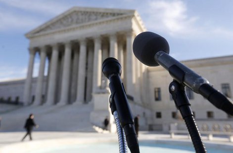 Microphones are set up for attorneys in front of the U.S. Supreme Court after delivering their oral arguments on the first day of a case inv Microphones are set up for attorneys in front of the U.S. Supreme Court after delivering their oral arguments on the first day of a case inv