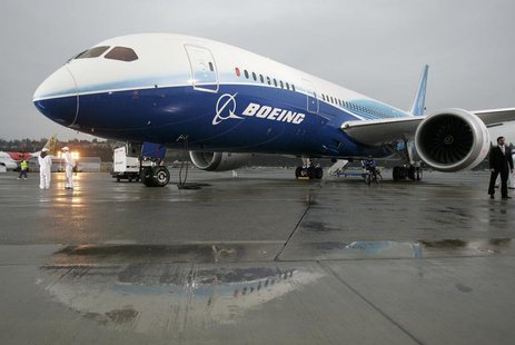 The Boeing 787 Dreamliner sits on the tarmac at Boeing Field in Seattle, Washington after its maiden flight, December 15, 2009. REUTERS/Robe The Boeing 787 Dreamliner sits on the tarmac at Boeing Field in Seattle, Washington after its maiden flight, December 15, 2009. REUTERS/Robe