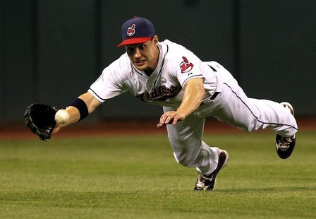 Cleveland Indians Grady Sizemore fails to make a diving catch on a hit by Alex Rodriguez during the ninth inning of the Indians MLB American Cleveland Indians Grady Sizemore fails to make a diving catch on a hit by Alex Rodriguez during the ninth inning of the Indians MLB American