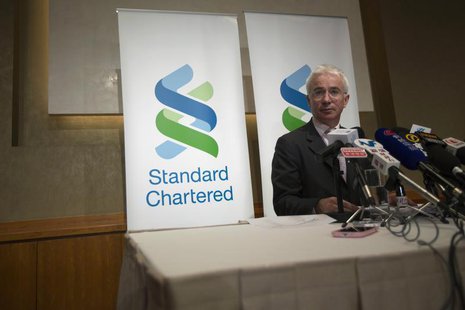 Standard Chartered Group Chief Executive Peter Sands speaks during a news conference in Hong Kong March 13, 2013. REUTERS/Tyrone Siu Standard Chartered Group Chief Executive Peter Sands speaks during a news conference in Hong Kong March 13, 2013. REUTERS/Tyrone Siu