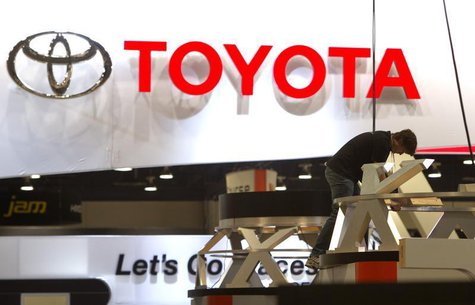 A worker sets up a display near the Toyota booth in preparation for the 2014 Consumer Electronics Show (CES) at the Las Vegas Convention Cen A worker sets up a display near the Toyota booth in preparation for the 2014 Consumer Electronics Show (CES) at the Las Vegas Convention Cen