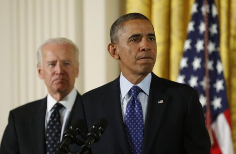 U.S. Vice President Joe Biden listens as President Barack Obama speaks during an event for the Council on Women and Girls at the White House U.S. Vice President Joe Biden listens as President Barack Obama speaks during an event for the Council on Women and Girls at the White House
