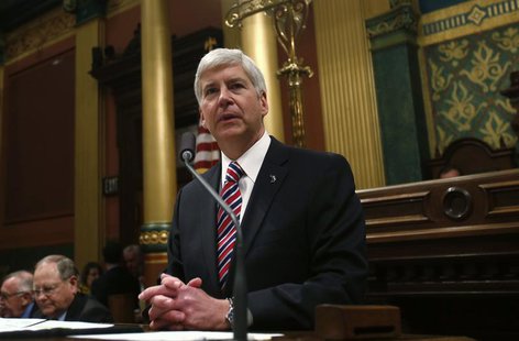 Michigan's Governor Rick Snyder gives his annual State of the State address to the Assembly at the State Capitol in Lansing, Michigan Januar Michigan's Governor Rick Snyder gives his annual State of the State address to the Assembly at the State Capitol in Lansing, Michigan Januar