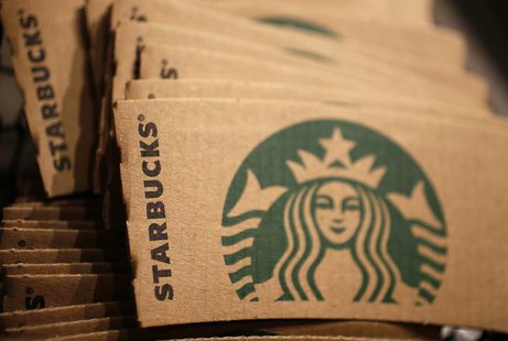 Branded packaging is seen in Starbucks' Vigo Street branch in Mayfair, central London January 11, 2013. REUTERS/Stefan Wermuth Branded packaging is seen in Starbucks' Vigo Street branch in Mayfair, central London January 11, 2013. REUTERS/Stefan Wermuth
