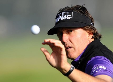 Jan 23, 2014; La Jolla, CA, USA; Phil Mickelson warms up on the driving range prior to the first round of the Farmers Inurance Open golf tou Jan 23, 2014; La Jolla, CA, USA; Phil Mickelson warms up on the driving range prior to the first round of the Farmers Inurance Open golf tou