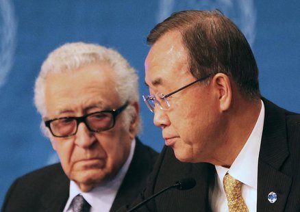 U.N. special envoy for Syria Lakhdar Brahimi speaks to U.N. Secretary-General Ban Ki-moon (R) during a news conference after the Geneva-2 pe U.N. special envoy for Syria Lakhdar Brahimi speaks to U.N. Secretary-General Ban Ki-moon (R) during a news conference after the Geneva-2 pe