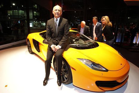 Ron Dennis, executive chairman of McLaren Automotive, sits on a MP4-12C during the opening of the first North American McLaren Automotive de Ron Dennis, executive chairman of McLaren Automotive, sits on a MP4-12C during the opening of the first North American McLaren Automotive de