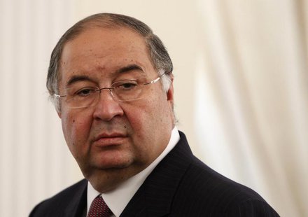 Uzbek-born Russian businessman Alisher Usmanov attends a meeting between Russian President Vladimir Putin and Crown Prince of Abu Dhabi Shei Uzbek-born Russian businessman Alisher Usmanov attends a meeting between Russian President Vladimir Putin and Crown Prince of Abu Dhabi Shei
