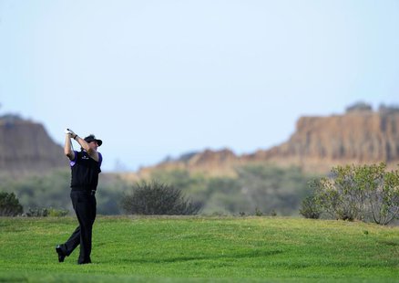 Jan 23, 2014; La Jolla, CA, USA; Phil Mickelson watches his second shot on the eighth hole during the first round of the Farmers Insurance O Jan 23, 2014; La Jolla, CA, USA; Phil Mickelson watches his second shot on the eighth hole during the first round of the Farmers Insurance O