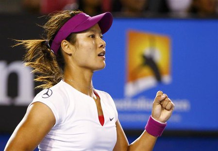 Li Na of China reacts during her women's singles final match against Dominika Cibulkova of Slovakia at the Australian Open 2014 tennis tourn Li Na of China reacts during her women's singles final match against Dominika Cibulkova of Slovakia at the Australian Open 2014 tennis tourn