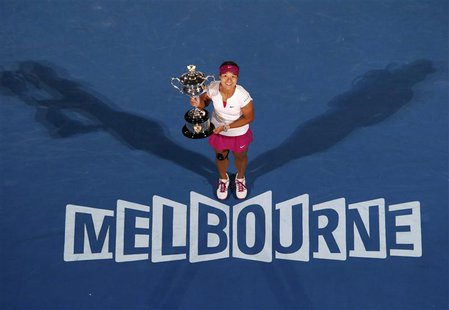Li Na of China poses with The Daphne Akhurst Memorial Cup after defeating Dominika Cibulkova of Slovakia in their women's singles final matc Li Na of China poses with The Daphne Akhurst Memorial Cup after defeating Dominika Cibulkova of Slovakia in their women's singles final matc