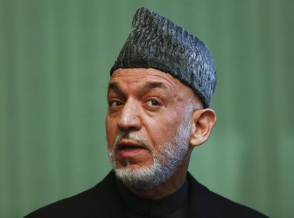 Afghan President Hamid Karzai speaks during a news conference in Kabul January 25, 2014. REUTERS/Mohammad Ismail Afghan President Hamid Karzai speaks during a news conference in Kabul January 25, 2014. REUTERS/Mohammad Ismail