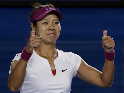 Li Na of China celebrates defeating Dominika Cibulkova of Slovakia in their women's singles final match at the Australian Open 2014 tennis t Li Na of China celebrates defeating Dominika Cibulkova of Slovakia in their women's singles final match at the Australian Open 2014 tennis t