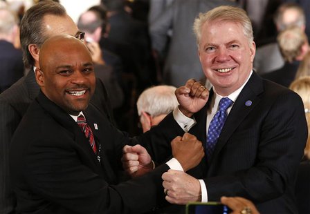 Mayors Michael Hancock of Denver (L) and Ed Murray of Seattle pose for pictures as they pretend to fight for the upcoming Super Bowl XLVIII Mayors Michael Hancock of Denver (L) and Ed Murray of Seattle pose for pictures as they pretend to fight for the upcoming Super Bowl XLVIII