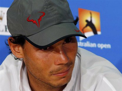 Rafael Nadal of Spain attends a news conference after losing his men's singles final match against Stanislas Wawrinka of Switzerland at the Rafael Nadal of Spain attends a news conference after losing his men's singles final match against Stanislas Wawrinka of Switzerland at the