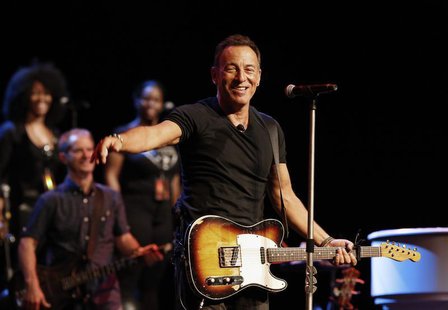 Singer Bruce Springsteen greets journalists during a sound check session ahead of his concert in Cape Town, January 26, 2014. REUTERS/Mike H Singer Bruce Springsteen greets journalists during a sound check session ahead of his concert in Cape Town, January 26, 2014. REUTERS/Mike H
