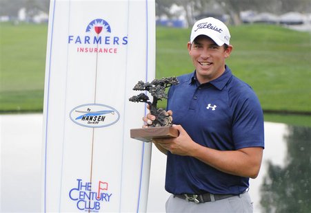 Jan 26, 2014; La Jolla, CA, USA; Scott Stallings poses with the Farmers Insurance Open championship trophy after the third round of the Farm Jan 26, 2014; La Jolla, CA, USA; Scott Stallings poses with the Farmers Insurance Open championship trophy after the third round of the Farm