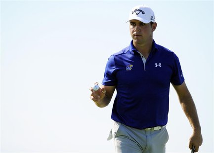 Jan 25, 2014; La Jolla, CA, USA; Gary Woodland after making his putt on the fourteenth hole during the third round of the Farmers Insurance Jan 25, 2014; La Jolla, CA, USA; Gary Woodland after making his putt on the fourteenth hole during the third round of the Farmers Insurance