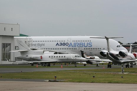The Airbus A380, the world's largest jerliner with a wingspan of almost 80 meters (yards), is seen on the tarmac near the structre which the The Airbus A380, the world's largest jerliner with a wingspan of almost 80 meters (yards), is seen on the tarmac near the structre which the