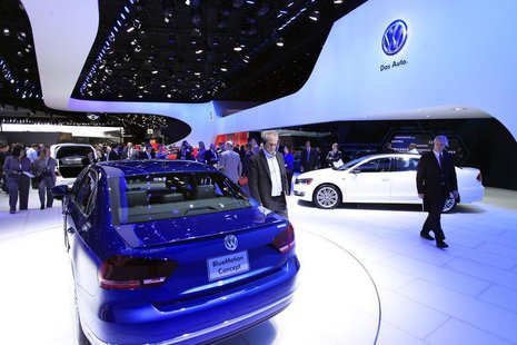 Visitors look at the Volkswagen Passat Blue Motion Concept during the North American International Auto Show in Detroit, Michigan January 15 Visitors look at the Volkswagen Passat Blue Motion Concept during the North American International Auto Show in Detroit, Michigan January 15