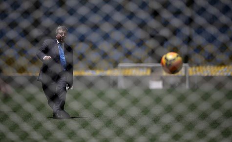 International Olympic Committee (IOC) President Thomas Bach kicks a soccer ball during a visit to Maracana stadium in Rio de Janeiro January International Olympic Committee (IOC) President Thomas Bach kicks a soccer ball during a visit to Maracana stadium in Rio de Janeiro January