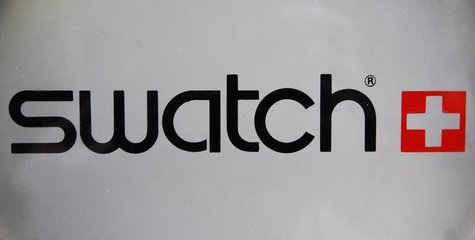 The logo of Swiss watchmaker Swatch is seen on the door of a Swatch watches shop in Strasbourg March 12, 2009. REUTERS/Vincent Kessler The logo of Swiss watchmaker Swatch is seen on the door of a Swatch watches shop in Strasbourg March 12, 2009. REUTERS/Vincent Kessler