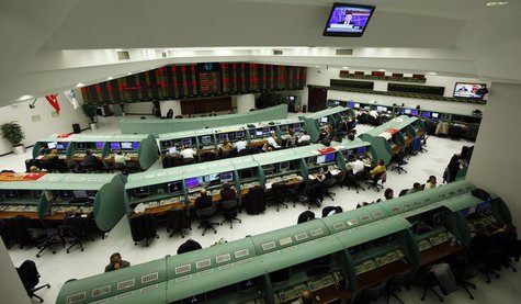 Traders work on their computers during the start of the first trading session of 2012 at the Istanbul Stock Exchange January 2, 2012. REUTER Traders work on their computers during the start of the first trading session of 2012 at the Istanbul Stock Exchange January 2, 2012. REUTER