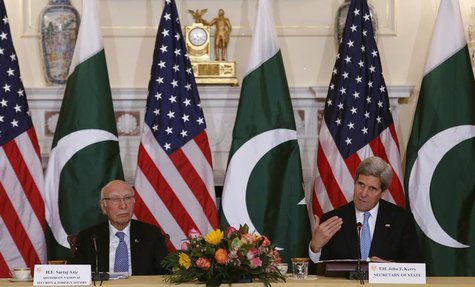 U.S. Secretary of State John Kerry (R) and Pakistan's National Security and Foreign Affairs Advisor Sartaj Aziz deliver opening remarks at a U.S. Secretary of State John Kerry (R) and Pakistan's National Security and Foreign Affairs Advisor Sartaj Aziz deliver opening remarks at a