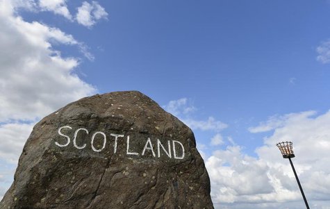 A marker stone is seen at Carter Bar in the Scottish Borders August 22, 2013. REUTERS/Toby Melville A marker stone is seen at Carter Bar in the Scottish Borders August 22, 2013. REUTERS/Toby Melville