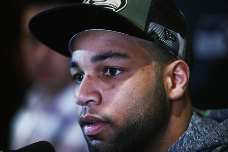 Seattle Seahawks receiver Golden Tate addresses the media during a news conference at Newport in New Jersey, January 27, 2014. REUTERS/Eduar Seattle Seahawks receiver Golden Tate addresses the media during a news conference at Newport in New Jersey, January 27, 2014. REUTERS/Eduar