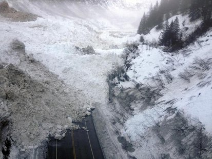 Avalanche debris is pictured on the Richardson Highway in Alaska in this January 25, 2014 handout photo. REUTERS/Alaska Department of Transp Avalanche debris is pictured on the Richardson Highway in Alaska in this January 25, 2014 handout photo. REUTERS/Alaska Department of Transp