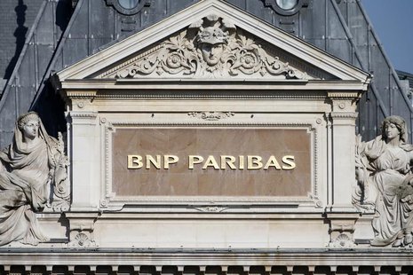 The BNP Paribas plaque is seen on the roof of one of their main banks in central Paris February 18, 2013. REUTERS/Charles Platiau The BNP Paribas plaque is seen on the roof of one of their main banks in central Paris February 18, 2013. REUTERS/Charles Platiau