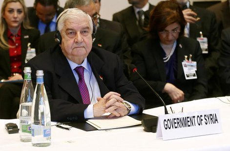 Syria's Foreign Minister Walid al-Moualem awaits the peace talks in Montreux January 22, 2014. REUTERS/Arnd Wiegmann Syria's Foreign Minister Walid al-Moualem awaits the peace talks in Montreux January 22, 2014. REUTERS/Arnd Wiegmann