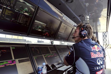Red Bull Team Principal Christian Horner watches the monitors during the qualifying session ahead of the Formula One Japanese Grand Prix in Red Bull Team Principal Christian Horner watches the monitors during the qualifying session ahead of the Formula One Japanese Grand Prix in