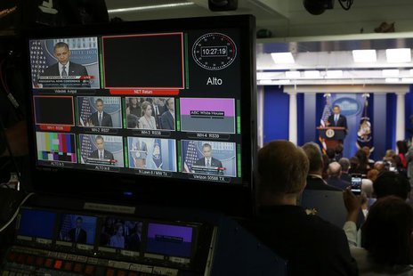 U.S. President Barack Obama is seen on a network video distribution console while he talks about the economy in the White House Press Briefi U.S. President Barack Obama is seen on a network video distribution console while he talks about the economy in the White House Press Briefi