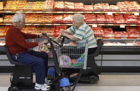 Customers shop for meat at Wal-Mart in Rogers, Arkansas, June 4, 2009. REUTERS/Jessica Rinaldi Customers shop for meat at Wal-Mart in Rogers, Arkansas, June 4, 2009. REUTERS/Jessica Rinaldi