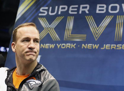 Denver Broncos quarterback Peyton Manning pauses during Media Day for Super Bowl XLVIII at the Prudential Center in Newark, New Jersey Janua Denver Broncos quarterback Peyton Manning pauses during Media Day for Super Bowl XLVIII at the Prudential Center in Newark, New Jersey Janua