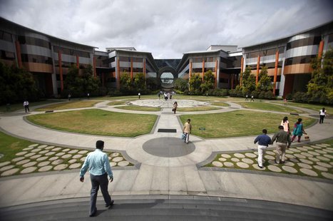 Employees walk in a forecourt at the Infosys campus in the Electronic City area of Bangalore September 4, 2012. REUTERS/Vivek Prakash Employees walk in a forecourt at the Infosys campus in the Electronic City area of Bangalore September 4, 2012. REUTERS/Vivek Prakash