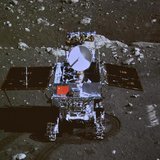 A photograph of the giant screen at the Beijing Aerospace Control Center shows photo of the Yutu, or "Jade Rabbit" lunar rover taken by the A photograph of the giant screen at the Beijing Aerospace Control Center shows photo of the Yutu, or "Jade Rabbit" lunar rover taken by the