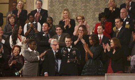 U.S. Army Ranger Sgt. First Class Cory Remsburg, injured while serving in Afghanistan, gives a thumbs up during a standing ovation for him a U.S. Army Ranger Sgt. First Class Cory Remsburg, injured while serving in Afghanistan, gives a thumbs up during a standing ovation for him a