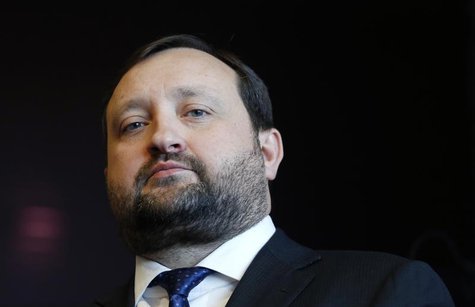Ukraine's First Deputy Prime Minister Serhiy Arbuzov waits for a meeting with European Enlargement Commissioner Stefan Fule (unseen) at the Ukraine's First Deputy Prime Minister Serhiy Arbuzov waits for a meeting with European Enlargement Commissioner Stefan Fule (unseen) at the