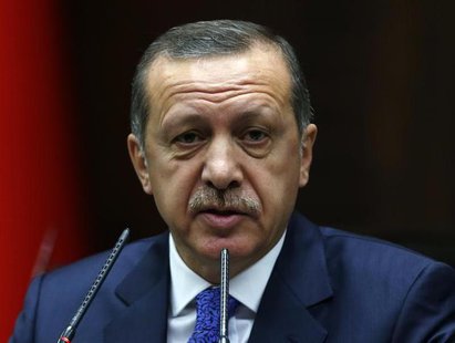 Turkey's Prime Minister Tayyip Erdogan addresses members of parliament from his ruling AK Party (AKP) during a meeting at the Turkish parlia Turkey's Prime Minister Tayyip Erdogan addresses members of parliament from his ruling AK Party (AKP) during a meeting at the Turkish parlia