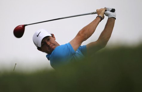 Rory McIlroy of Northern Ireland tees off on the third hole during Abu Dhabi Golf championship January 19, 2014. REUTERS/Ahmed Jadallah Rory McIlroy of Northern Ireland tees off on the third hole during Abu Dhabi Golf championship January 19, 2014. REUTERS/Ahmed Jadallah