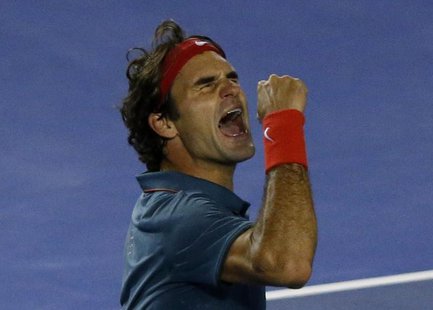 Roger Federer of Switzerland celebrates defeating Andy Murray of Britain in their men's singles quarter-final tennis match at the Australian Roger Federer of Switzerland celebrates defeating Andy Murray of Britain in their men's singles quarter-final tennis match at the Australian