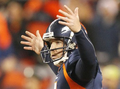 Denver Broncos kicker Matt Prater celebrates after he kicked the game tying field goal in regulation against the Chicago Bears in their NFL Denver Broncos kicker Matt Prater celebrates after he kicked the game tying field goal in regulation against the Chicago Bears in their NFL