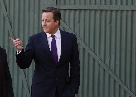 Britain's Prime Minister David Cameron pays a visit to small businesses at Lots Ait Boatyard in Brentford, west London January 27, 2014. REU Britain's Prime Minister David Cameron pays a visit to small businesses at Lots Ait Boatyard in Brentford, west London January 27, 2014. REU